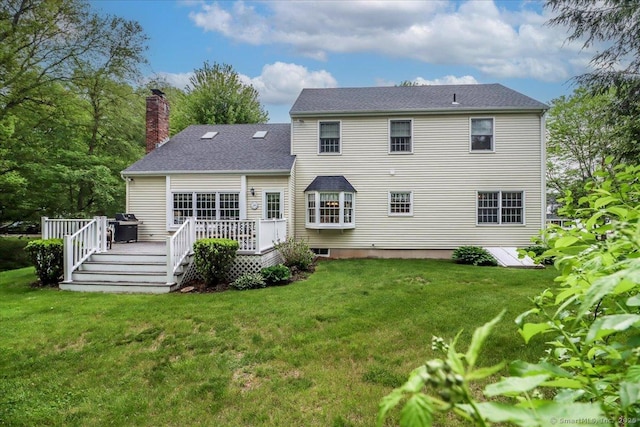 9 Rosick Rd, Wallingford, CT 06492 - rear view of property featuring a chimney, a yard, and a deck
