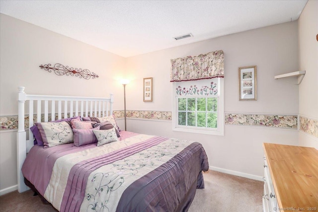 9 Rosick Rd, Wallingford, CT 06492 - bedroom with carpet flooring and baseboards