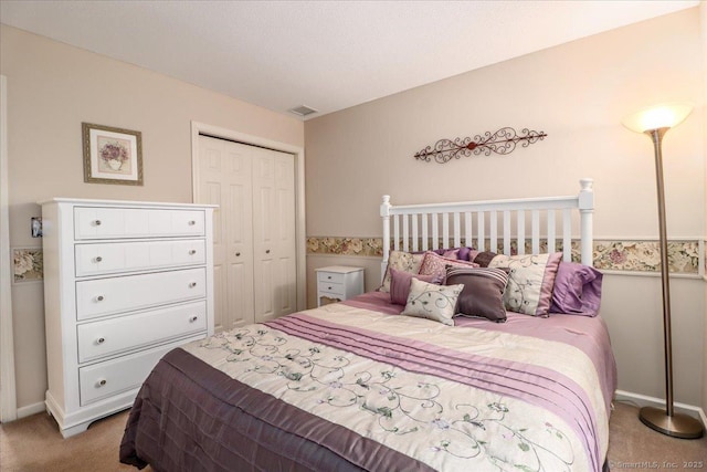 9 Rosick Rd, Wallingford, CT 06492 - carpeted bedroom featuring a closet and baseboards