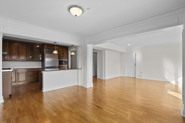 16 Hayestown Rd Unit C204, Danbury, CT 06811 - unfurnished living room with ornamental molding and light wood-style flooring