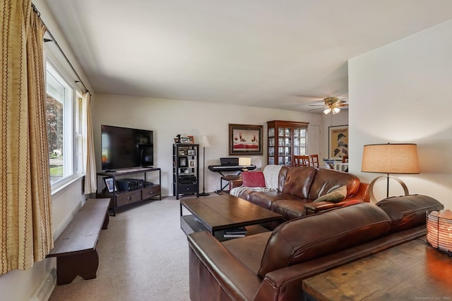 90 Russell Rd, Stratford, CT 06614 - living room featuring a ceiling fan and light colored carpet