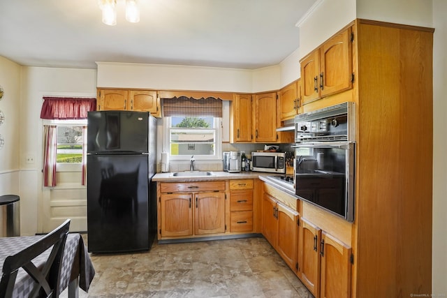 90 Russell Rd, Stratford, CT 06614 - kitchen with black appliances, a sink, plenty of natural light, and range hood