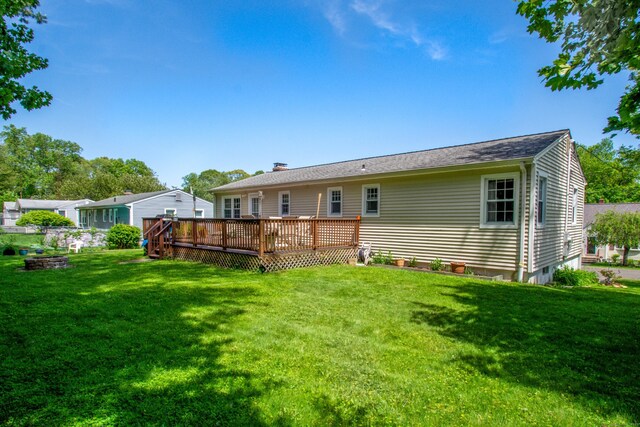 27 Lansing Ave, Trumbull, CT 06611 - rear view of property with a lawn, a deck, and a chimney