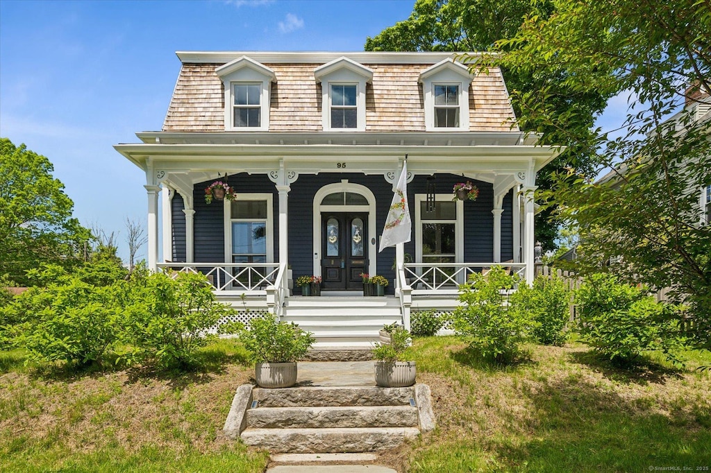 95 Gardner Ave, New London, CT 06320 - second empire-style home featuring mansard roof and covered porch