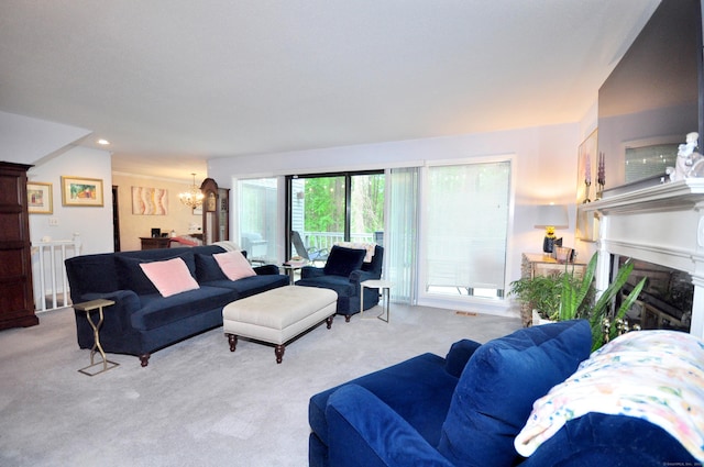 5 Spyglass Dr Unit 5, Avon, CT 06001 - living area with a chandelier, carpet floors, and a fireplace