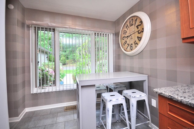5 Spyglass Dr Unit 5, Avon, CT 06001 - dining area with wallpapered walls and baseboards