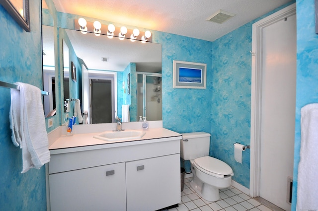 5 Spyglass Dr Unit 5, Avon, CT 06001 - bathroom featuring tile patterned floors, a stall shower, wallpapered walls, toilet, and vanity