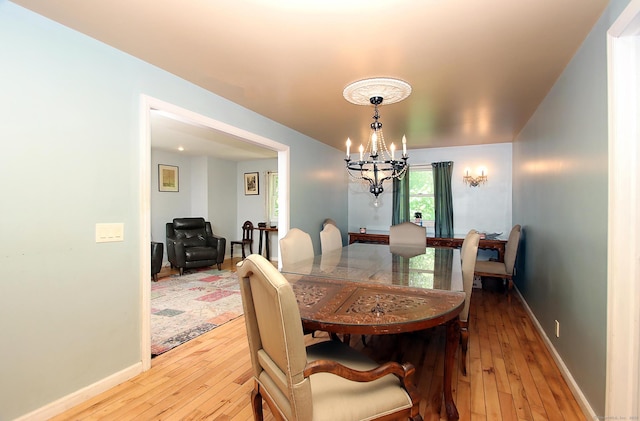 113 Codfish Hill Rd, Bethel, CT 06801 - dining room with a chandelier, hardwood / wood-style flooring, and baseboards