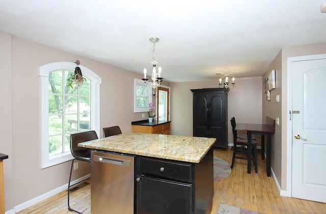 113 Codfish Hill Rd, Bethel, CT 06801 - kitchen with a chandelier, a kitchen island, light wood-style flooring, and healthy amount of natural light