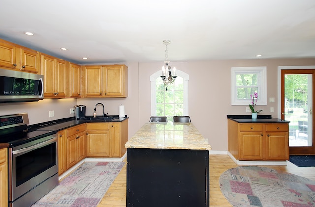113 Codfish Hill Rd, Bethel, CT 06801 - kitchen featuring stainless steel appliances, a chandelier, a sink, light wood finished floors, and recessed lighting
