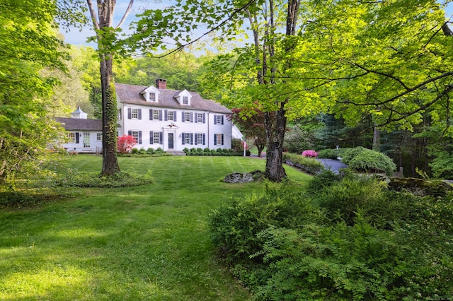 336 Old Branchville Rd, Ridgefield, CT 06877 - view of front facade with a front lawn and a chimney