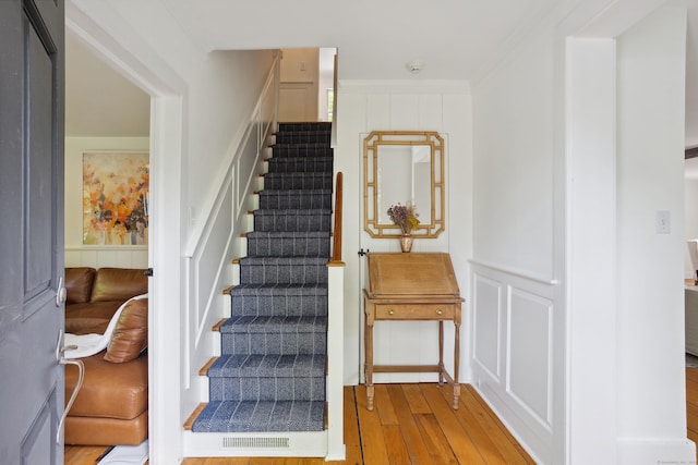 336 Old Branchville Rd, Ridgefield, CT 06877 - stairs featuring wood-type flooring and crown molding