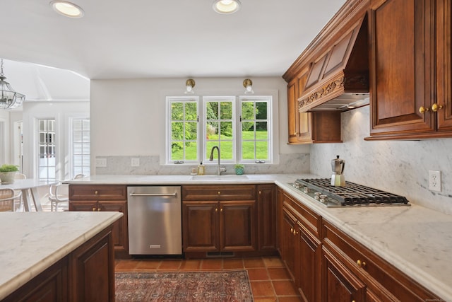 336 Old Branchville Rd, Ridgefield, CT 06877 - kitchen with a sink, appliances with stainless steel finishes, backsplash, dark tile patterned flooring, and light stone counters