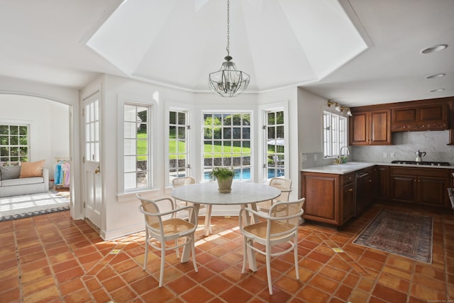 336 Old Branchville Rd, Ridgefield, CT 06877 - kitchen featuring light countertops, tasteful backsplash, a sink, and a chandelier