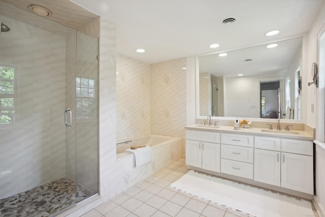 336 Old Branchville Rd, Ridgefield, CT 06877 - bathroom with a stall shower, a garden tub, tile patterned floors, double vanity, and recessed lighting
