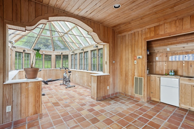 336 Old Branchville Rd, Ridgefield, CT 06877 - unfurnished sunroom featuring vaulted ceiling
