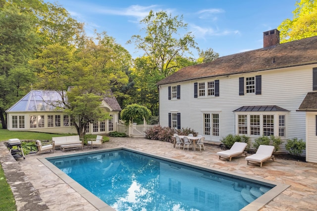 336 Old Branchville Rd, Ridgefield, CT 06877 - swimming pool featuring an exterior structure, french doors, a patio area, and an outdoor structure
