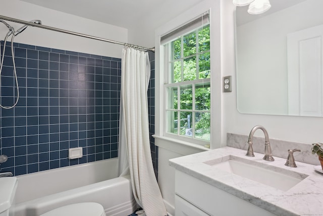 336 Old Branchville Rd, Ridgefield, CT 06877 - bathroom with healthy amount of natural light, shower / tub combo, vanity, and toilet