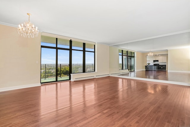 3200 Park Ave Unit 10A2, Bridgeport, CT 06604 - unfurnished living room featuring a chandelier, wood finished floors, baseboards, crown molding, and a wall of windows