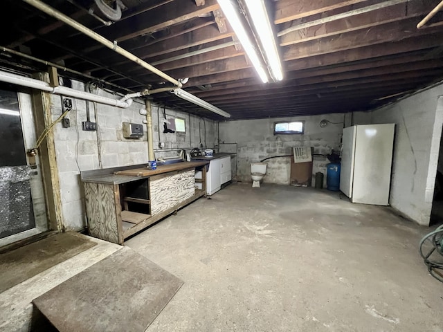 343 Lebanon Ave, Lebanon, CT 06249 - below grade area featuring freestanding refrigerator