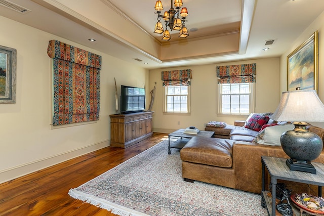 55 Lake Dr S, New Fairfield, CT 06812 - living room with a chandelier, wood finished floors, a raised ceiling, and baseboards