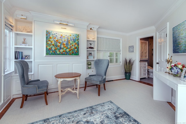 55 Lake Dr S, New Fairfield, CT 06812 - sitting room featuring crown molding, wood finished floors, and built in shelves