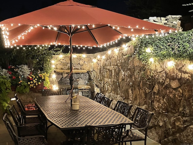 55 Lake Dr S, New Fairfield, CT 06812 - patio at twilight with outdoor dining space