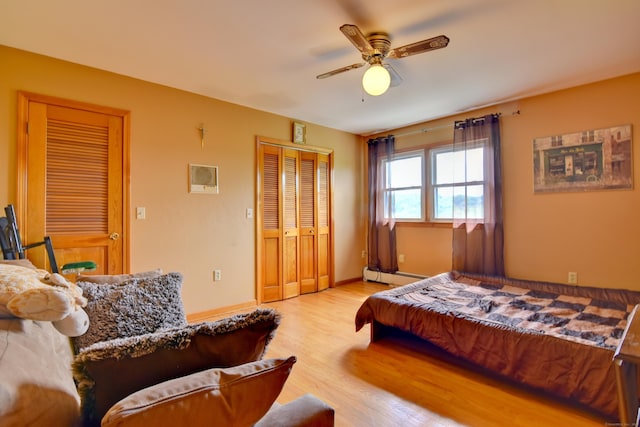 5 Yochers Ln, Derby, CT 06418 - bedroom featuring baseboard heating, wood finished floors, a ceiling fan, and baseboards