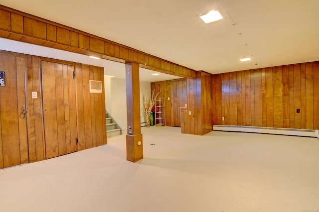 5 Yochers Ln, Derby, CT 06418 - finished basement featuring baseboard heating, wooden walls, stairs, and a baseboard heating unit