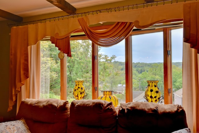 5 Yochers Ln, Derby, CT 06418 - sunroom with beam ceiling, plenty of natural light, and a wooded view
