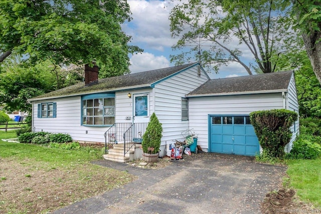 1 Triangle Ter, Danbury, CT 06810 - ranch-style home featuring an attached garage, a chimney, driveway, and roof with shingles