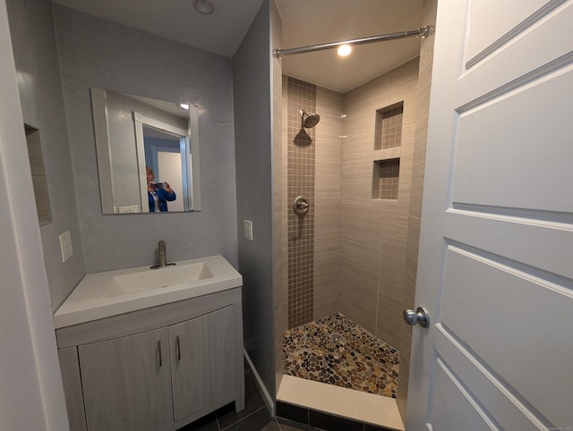 9 Washington Rd, Windsor, CT 06095 - full bath featuring a tile shower, vanity, and tile patterned floors