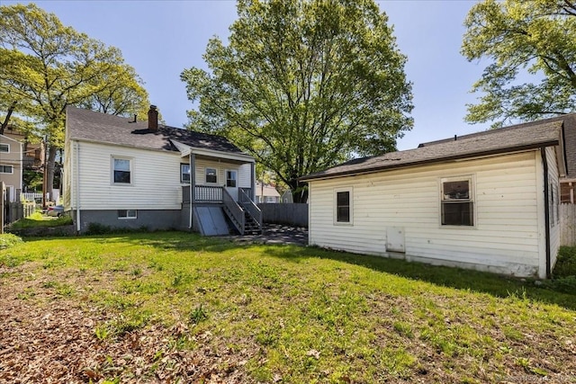 back of property featuring a chimney
