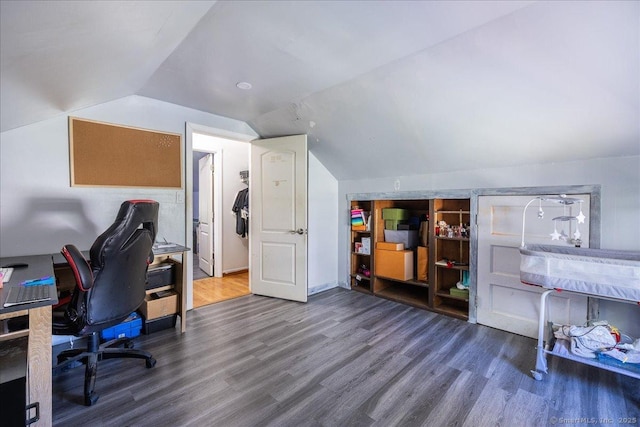 office area featuring vaulted ceiling and wood finished floors