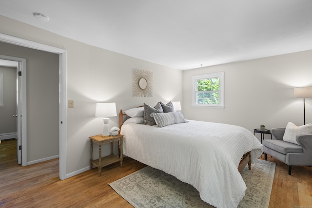 27 Scudder Rd, Newtown, CT 06470 - bedroom with wood finished floors and baseboards