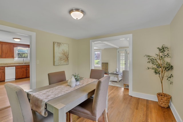 55 Dividend Rd, Rocky Hill, CT 06067 - dining area featuring light wood finished floors and baseboards