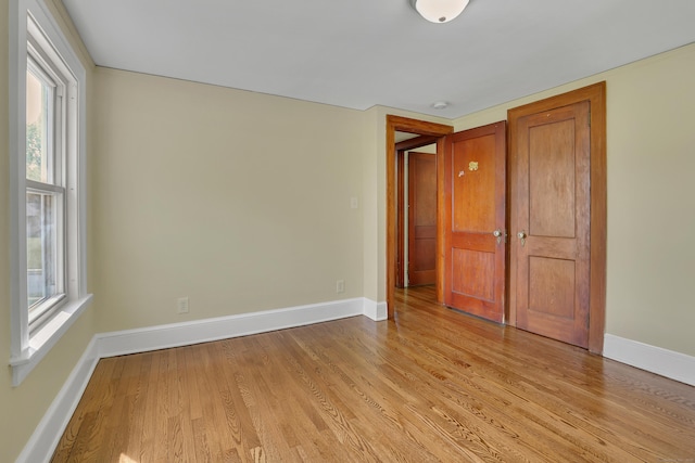 55 Dividend Rd, Rocky Hill, CT 06067 - spare room with light wood-style floors and baseboards