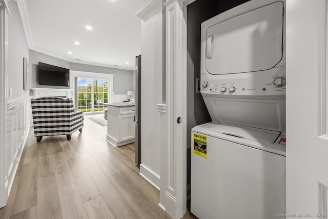210 Munson Rd Unit 3-C, Wolcott, CT 06716 - washroom featuring stacked washer / dryer, light wood-style floors, ornamental molding, and recessed lighting