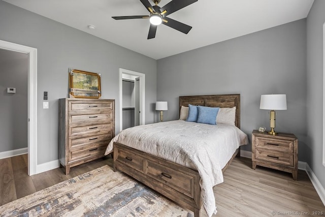 210 Munson Rd Unit 3-C, Wolcott, CT 06716 - bedroom featuring wood finished floors, a spacious closet, a ceiling fan, and a closet