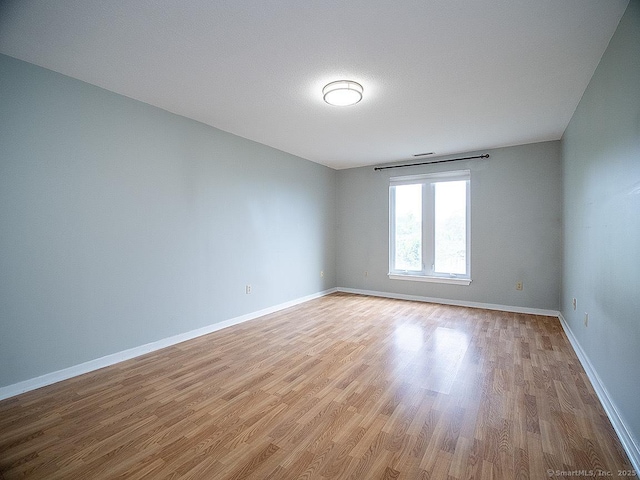 500 Prospect St Apt 3G, New Haven, CT 06511 - unfurnished room featuring light wood-style flooring and baseboards