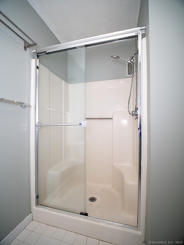 500 Prospect St Apt 3G, New Haven, CT 06511 - full bath featuring a shower stall, baseboards, and tile patterned flooring