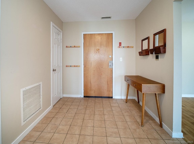 500 Prospect St Apt 3G, New Haven, CT 06511 - entryway with baseboards and light tile patterned flooring