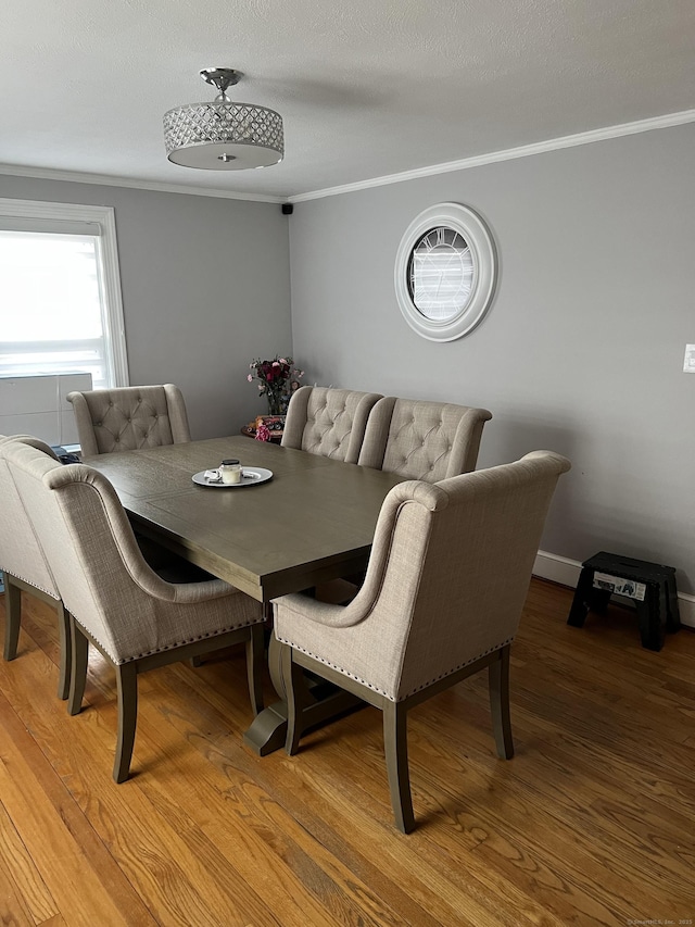 15 Michael Ave, East Hartford, CT 06111 - dining area featuring ornamental molding and light wood-style floors