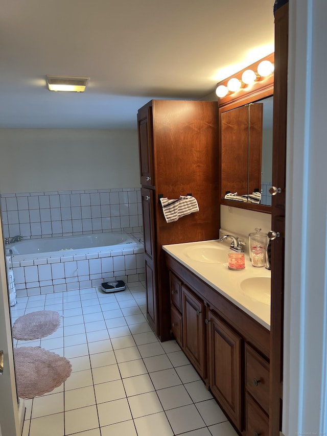 15 Michael Ave, East Hartford, CT 06111 - bathroom with tile patterned flooring, a relaxing tiled tub, and double vanity