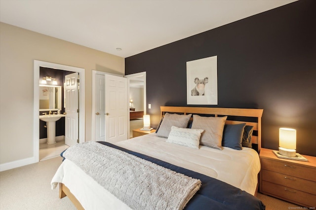 39 Gatewood Unit 39, Avon, CT 06001 - bedroom with carpet floors, ensuite bathroom, and baseboards