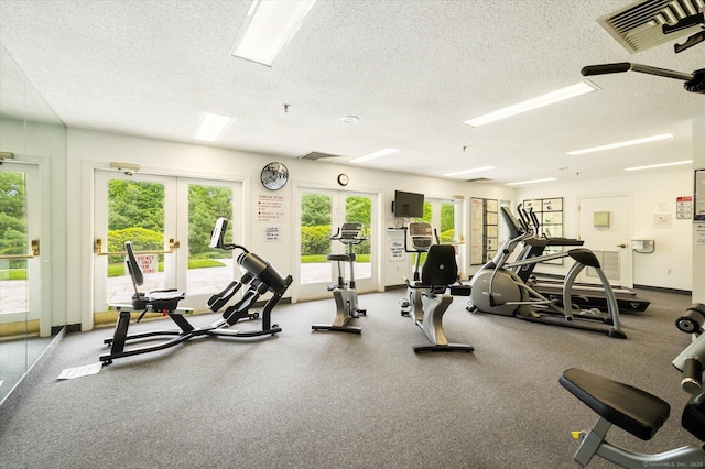 39 Gatewood Unit 39, Avon, CT 06001 - exercise room with french doors, a textured ceiling, and baseboards