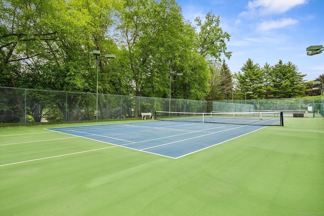 39 Gatewood Unit 39, Avon, CT 06001 - view of tennis court with community basketball court and view of wooded area