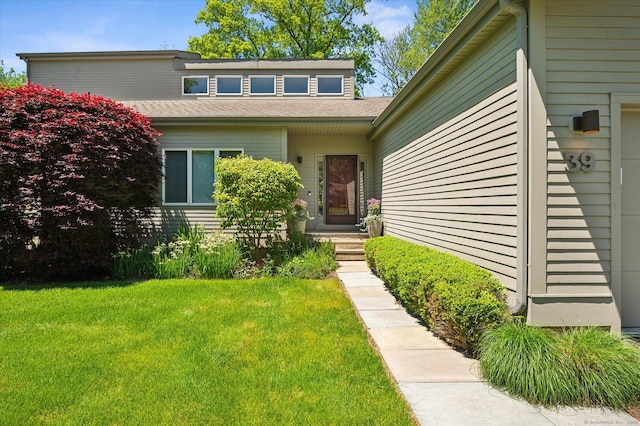 39 Gatewood Unit 39, Avon, CT 06001 - doorway to property featuring a yard
