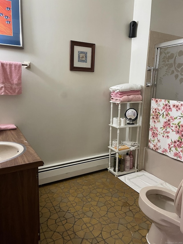 339 Washington Ave, West Haven, CT 06516 - bathroom featuring a shower stall, baseboard heating, and vanity
