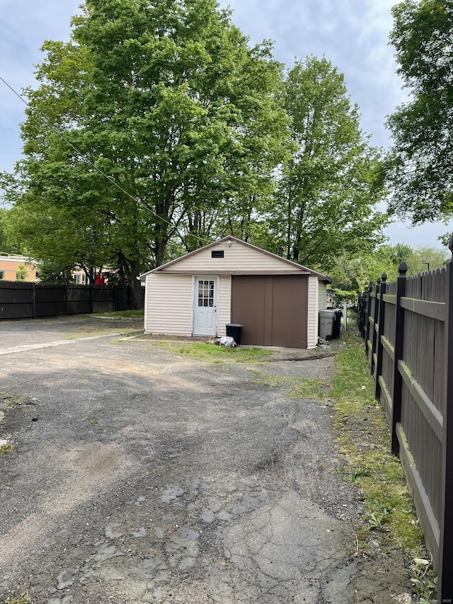 339 Washington Ave, West Haven, CT 06516 - view of outbuilding featuring fence and an outbuilding